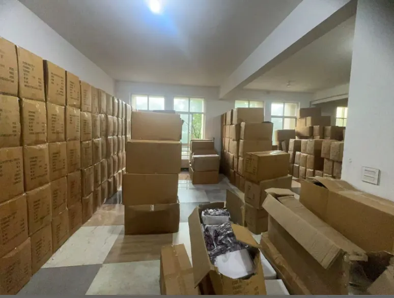Cartons and boxed eyewear stock inside the KUANGTU warehouse in Yiwu