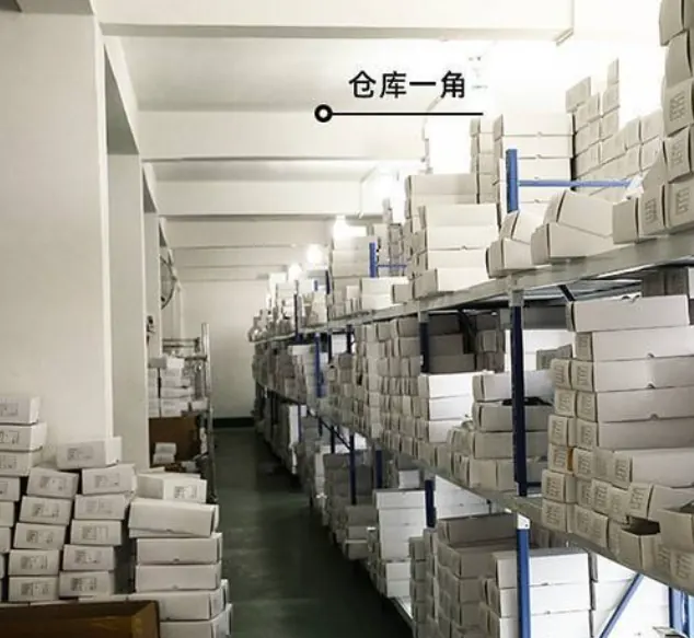 Boxed eyewear inventory arranged on warehouse shelving