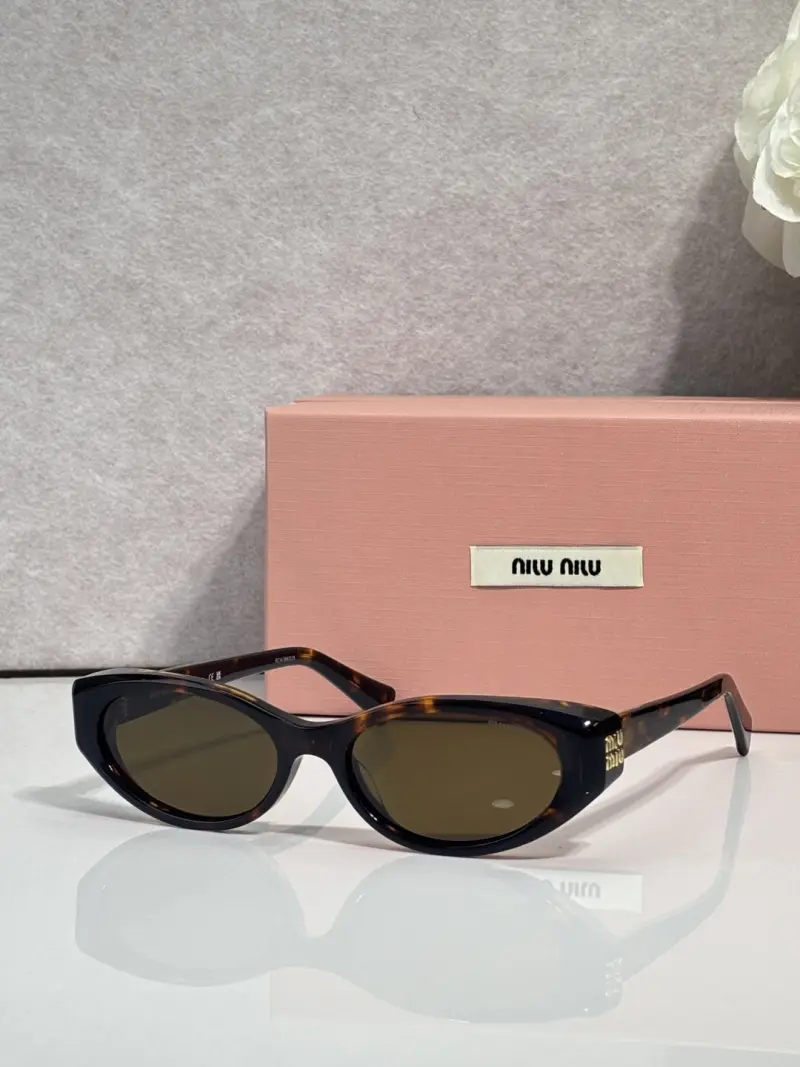 MIU MIU VMU 03Z-F oval designer sunglasses colorway 01, catalogue view 1